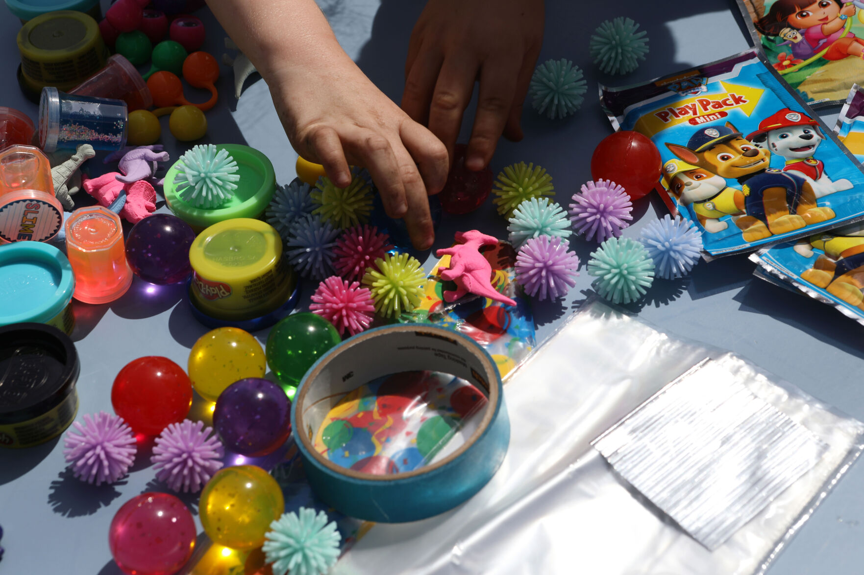 Children reach for toys
